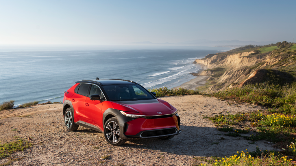 Toyota bZ4X parked on a cliffside