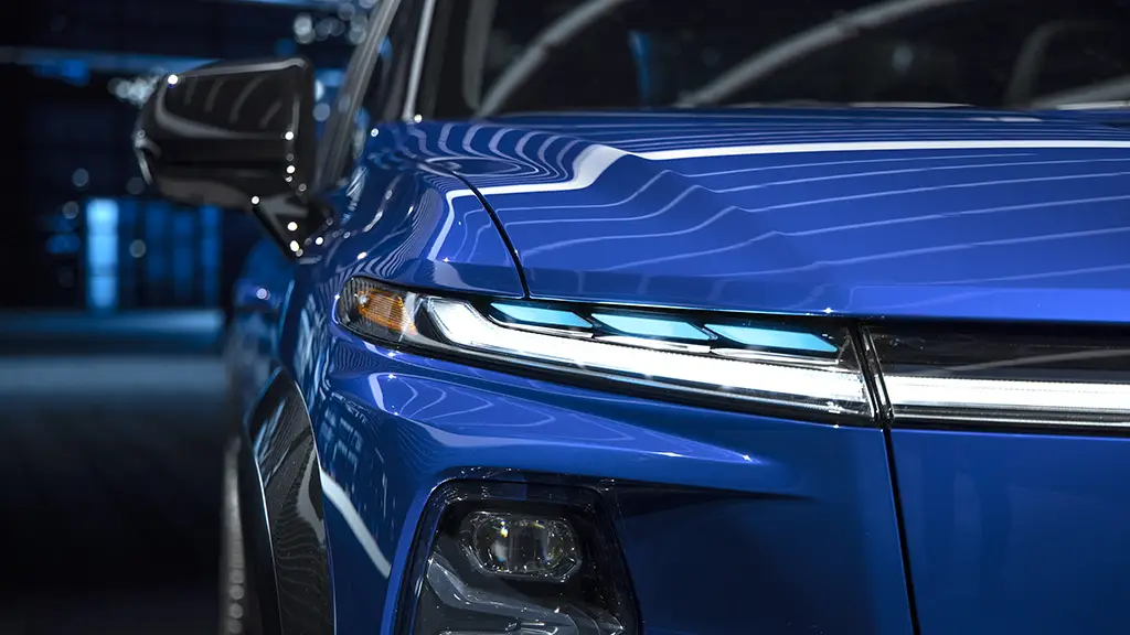 We see the headlights of a 2024 Silverado EV RST First Edition.