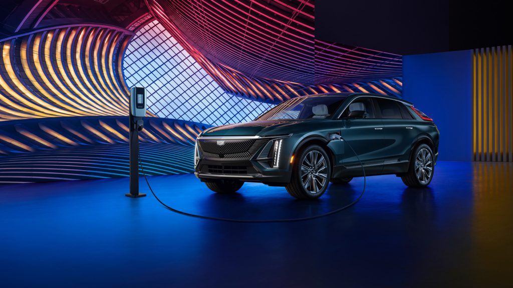 Cadillac Lyriq charging on a luminous stage