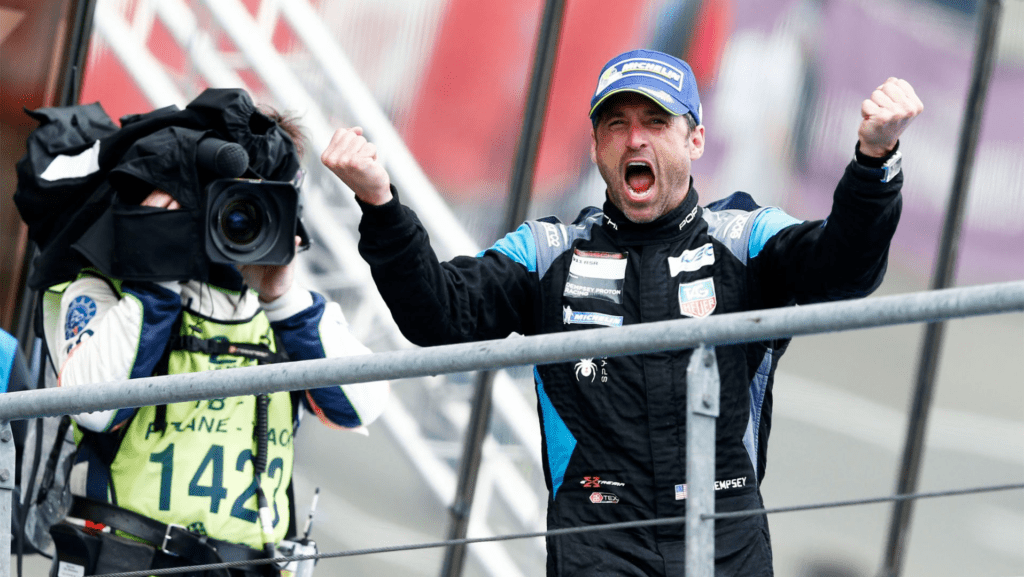 Actor Patrick Dempsey celebrating victory at the 24 Hours of Le Mans