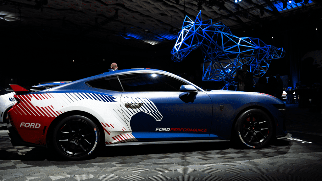 Mustang Dark Horse R Ford Performance livery with Mustang sculpture in background