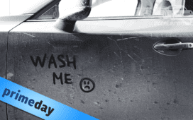 "Wash me" written by finger on a dusty car