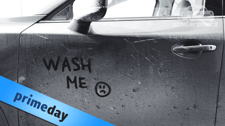 "Wash me" written by finger on a dusty car