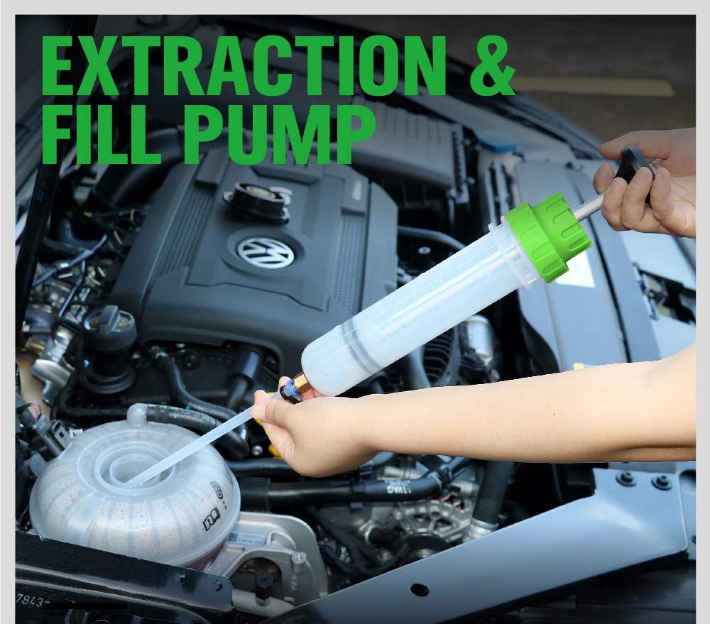A pump being used to remove fluid from a car