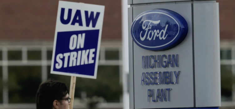 UAW member on strike outside Ford plant in Michigan
