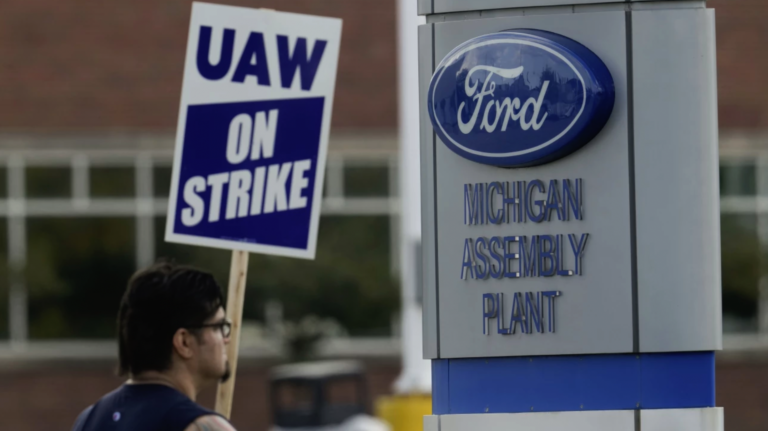 UAW member on strike outside Ford plant in Michigan