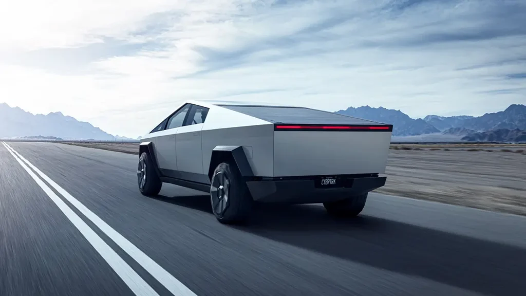 Image of a 2024 Tesla Cybertruck, seen from behind.